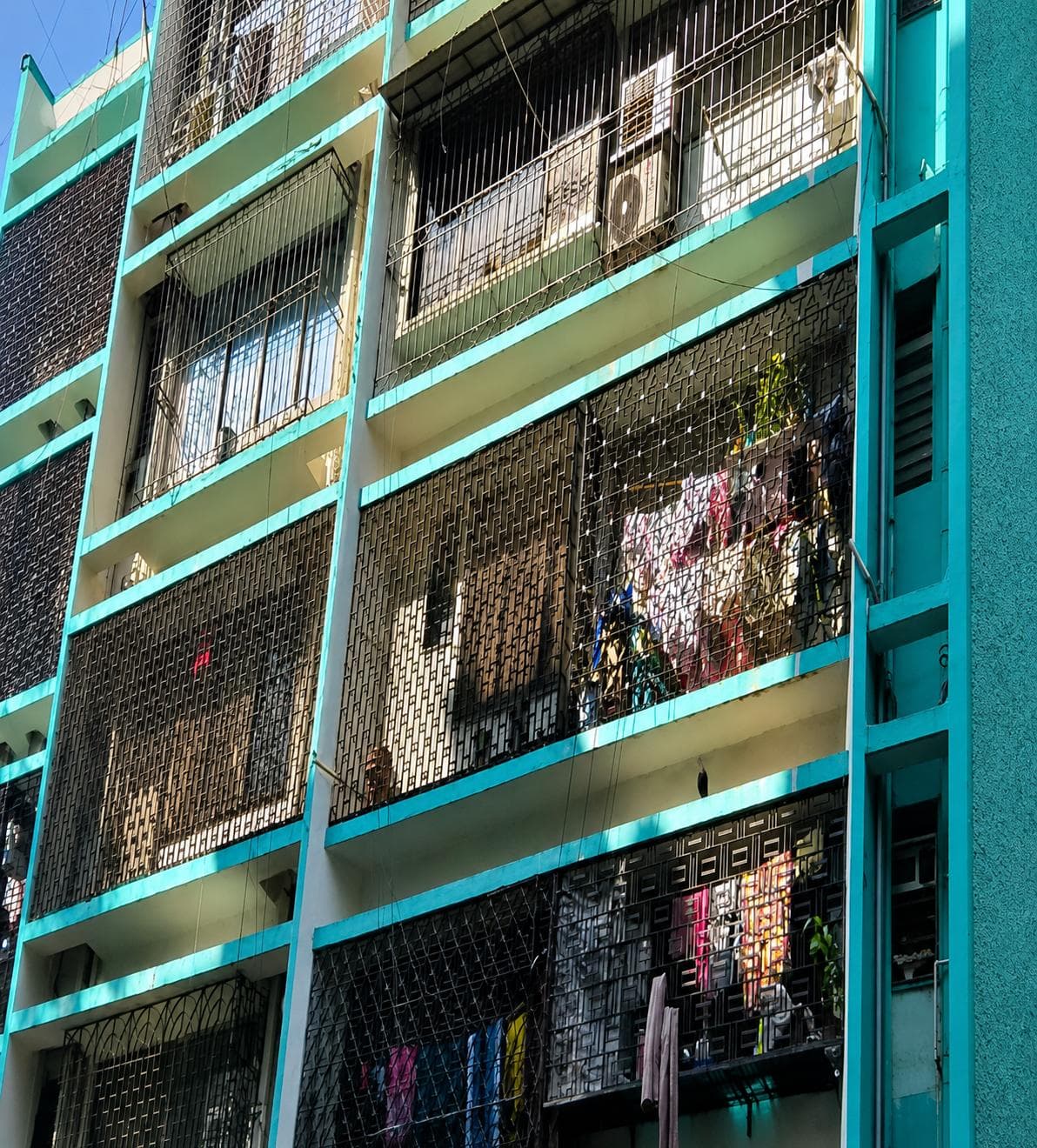 Turquoise Apartment Facade - Architectural Cover