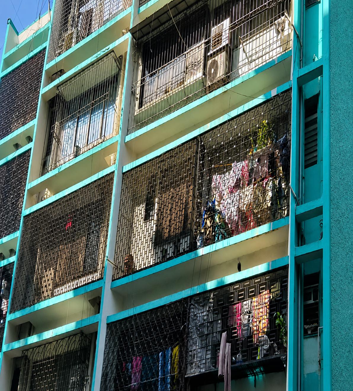 Turquoise Apartment Facade
